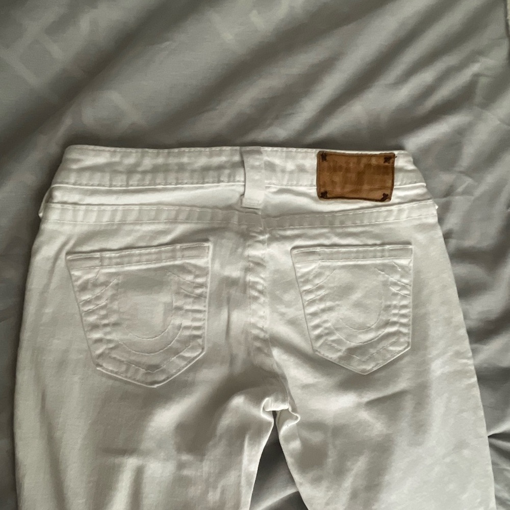 white low rise true religion skinny jeans